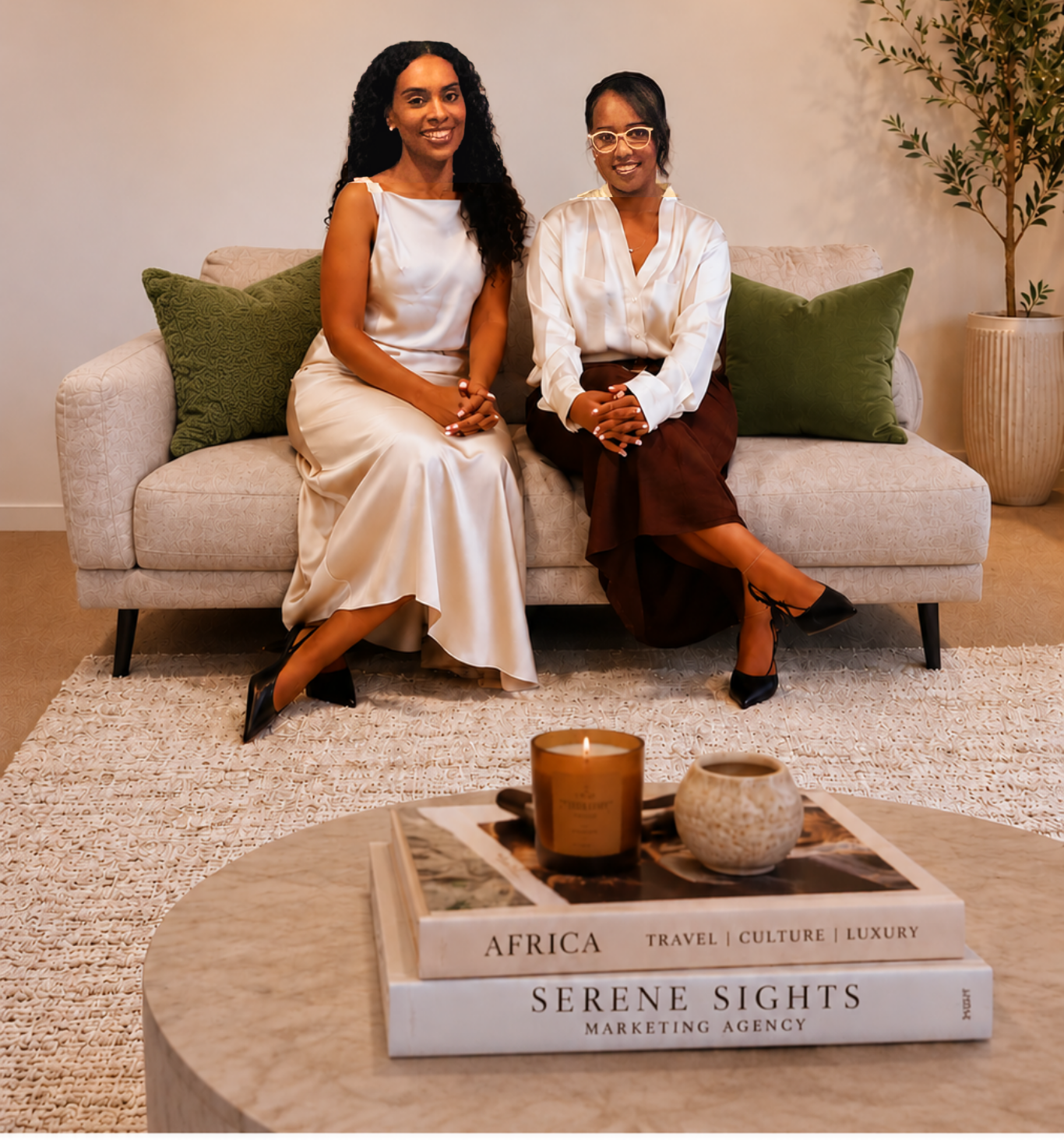 Nardos and Joanne, co-founders of Serene Sights Marketing, sitting together